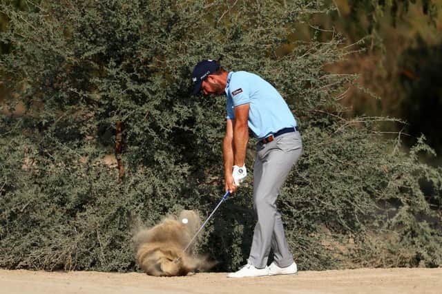 Scott Jamieson hits his second shot on the 14th hole during day two of the Slync.io Dubai Desert Classic at Emirates Golf Club. Picture: Francois Nel/Getty Images.