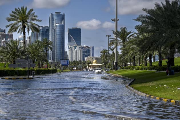 A flooded street following heavy rains in Sharjah. Dubai, the Middle East's financial centre, has been paralysed by the torrential rain that caused floods across the UAE and Bahrain and left 18 dead in Oman earlier this week.
