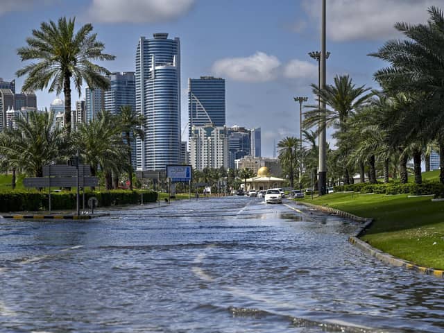 A flooded street following heavy rains in Sharjah. Dubai, the Middle East's financial centre, has been paralysed by the torrential rain that caused floods across the UAE and Bahrain and left 18 dead in Oman earlier this week.