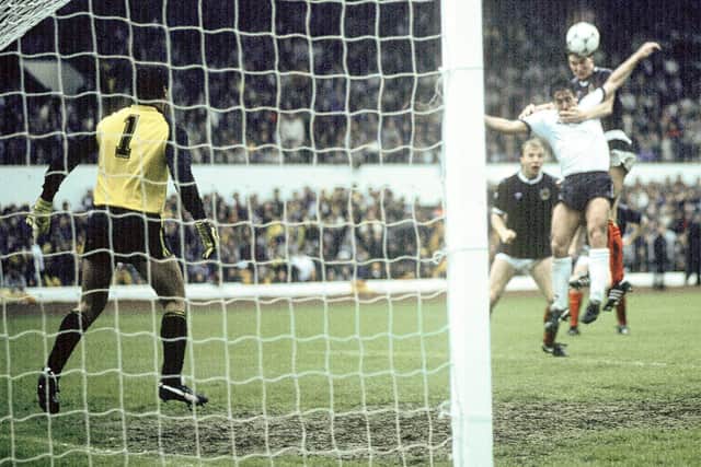 Scotland's Richard Gough (top right) outjumps Kenny Sansom to head the ball past goalkeeper Peter Shilton into the net for the match-winning goal in 1985.