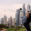 Calum Hill tees off on the iconic eighth hole at Emirates Golf Club during the Hero Dubai Desert Classic. Picture: Karim Sahib/AFP via Getty Images.