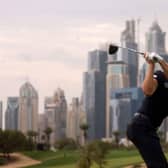 Calum Hill tees off on the iconic eighth hole at Emirates Golf Club during the Hero Dubai Desert Classic. Picture: Karim Sahib/AFP via Getty Images.