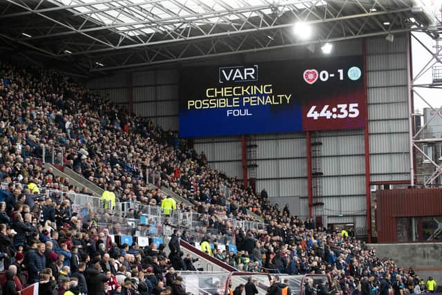 VAR checks a possible penalty in the Hearts v Celtic game. (Photo by Craig Williamson / SNS Group)