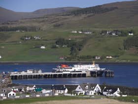 A ferry at Uig Harbour. Crew members on one of Scotland's lifeline ferries have put out a fire in an engine room, and operator CalMac has suspended services from Uig. Picture: CalMac/PA Wire