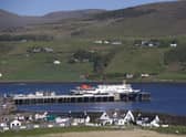 A ferry at Uig Harbour. Crew members on one of Scotland's lifeline ferries have put out a fire in an engine room, and operator CalMac has suspended services from Uig. Picture: CalMac/PA Wire