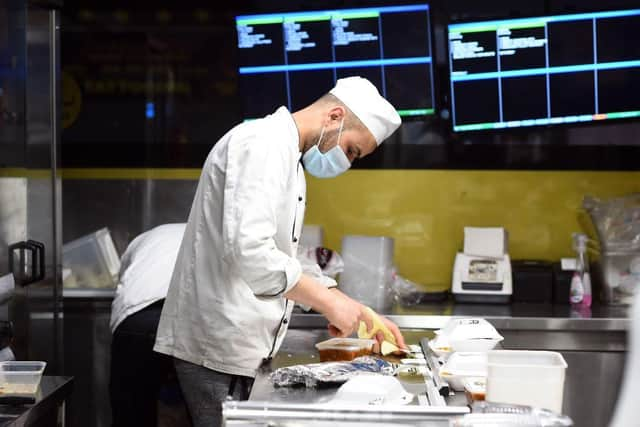 Scots will also be barred from entering hospitality businesses for takeaway services, meaning all sales of food or drink must take place outside the premises. (Photo by Andy BUCHANAN / AFP)