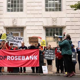 Demonstrators hold anti-Jackdaw and anti-Rosebank placards outside the Department for Energy Security and Net Zero in London yesterday (Picture: Brook Mitchell / AFP via Getty Images)