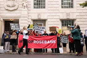 Demonstrators hold anti-Jackdaw and anti-Rosebank placards outside the Department for Energy Security and Net Zero in London yesterday (Picture: Brook Mitchell / AFP via Getty Images)