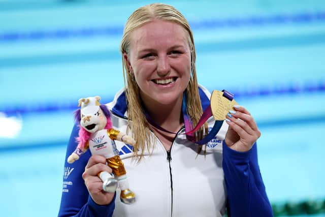 Scotland's Faye Rogers poses with her gold medal - and Finnie doll - after winning the Women's 200m Individual Medley SM10 Final at the Games (Picture: Michael Steele/Getty Images)
