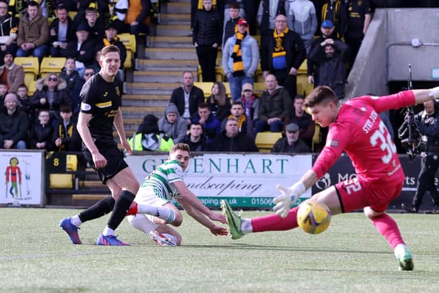 James Forrest scores Celtic's third in the 3-1 win at Livingston. Pic: Steve Welsh/PA Wire.
