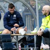 Scotland's Ben White looks dejected as he is substituted off with an ankle injury during the match against France at Murrayfield.  (Photo by Ross Parker / SNS Group)