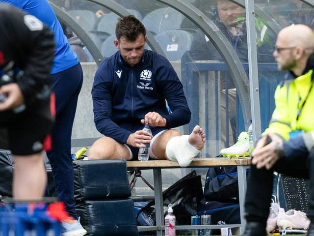 Scotland's Ben White looks dejected as he is substituted off with an ankle injury during the match against France at Murrayfield.  (Photo by Ross Parker / SNS Group)