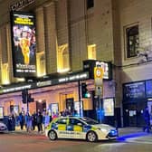 Police outside the Palace Theatre in Manchester after some members of the audience refused to remain seated (Pic: Tash Kenyon/Twitter/PA Wire)