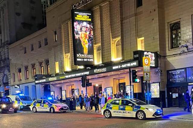 Police outside the Palace Theatre in Manchester after some members of the audience refused to remain seated (Pic: Tash Kenyon/Twitter/PA Wire)