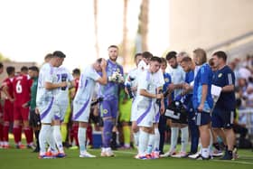 Players of Scotland drink water at the cool break during the friendly against Gibraltar.
