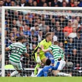 The ball is turned into his own net by Celtic defender Carl Starfelt under pressure from Rangers' Fashion Sakala.