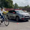 Researchers have been conducting virtual-reality and real-life tests to assess the best way of communicating to cyclists the intentions of self-driving vehicles