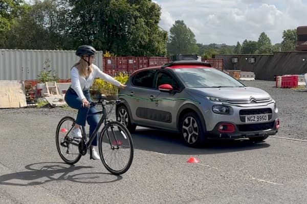 Researchers have been conducting virtual-reality and real-life tests to assess the best way of communicating to cyclists the intentions of self-driving vehicles
