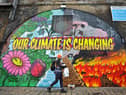 A mural painted in Glasgow near where the COP26 climate summit was held spoke of the urgency for real action (Picture: Jeff J Mitchell/Getty Images)