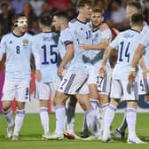 Stuart Armstrong is mobbed by his Scotland team-mates after brilliantly putting his side ahead against Armenia. Picture: AP
