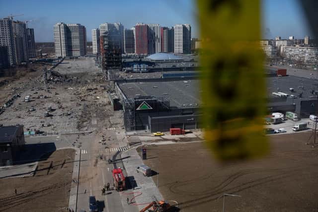 A view to the site of an explosion as a result of a missile strike into a shopping mall in Kyiv, Ukraine.