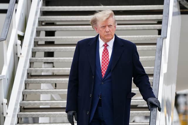 Former US president Donald Trump arrives in his private jet at Aberdeen International Airport, in Dyce, Aberdeen