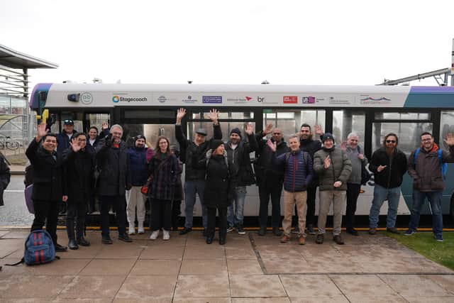 Passengers who made the first journey over the Forth Bridge on an autonomous bus