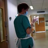 Junior doctor faces deportation from Scotland after delays with visa (Photo by HANNAH MCKAY/POOL/AFP via Getty Images).
