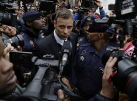 Oscar Pistorius leaves the High Court in Pretoria, South Africa, Tuesday June 14, 2016. A South African parole board is to consider whether former Paralympics star and convicted murderer Oscar Pistorius can be released from jail.