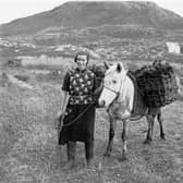 Taking home the peats on the Isle of Eriskay in the 1920s. © University of Edinburgh, Department of Celtic and Scottish Studies. Photograph by Werner Kissling