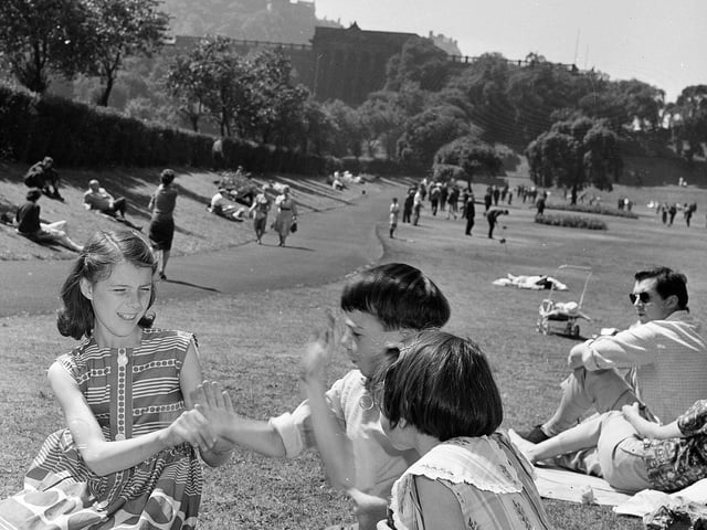 Edinburgh has a heatwave in July 1962, allowing children to enjoy some fun in the sun in Princes Street Gardens.