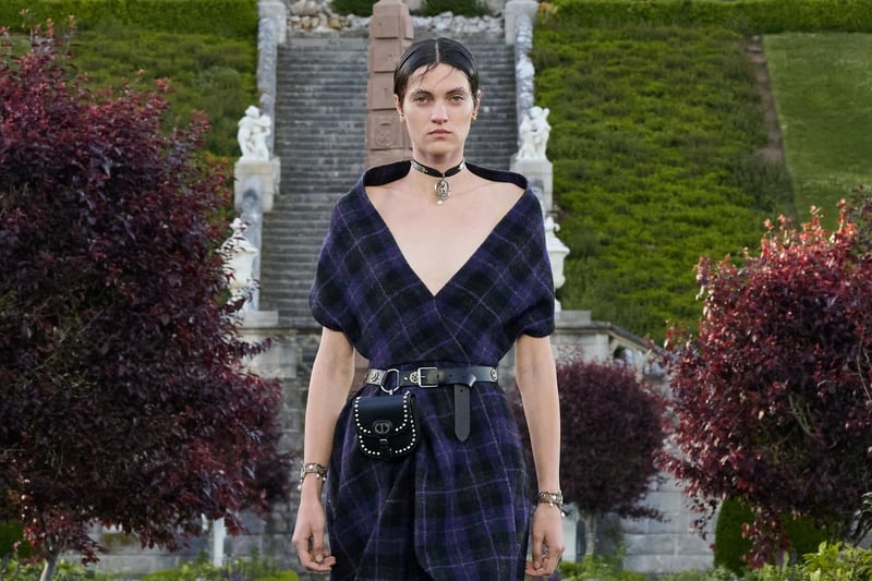 The first look in the show was this shawl-neck bluebell tartan dress