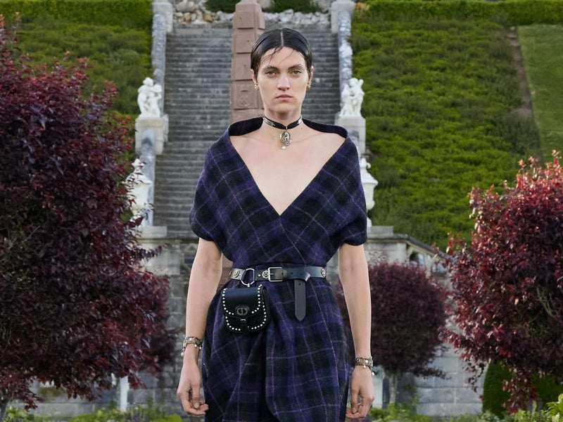 The first look in the show was this shawl-neck bluebell tartan dress