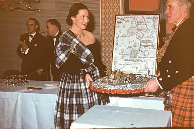 James Munro (right)  former president of the  US-based Caterpillar Tractor Company, at the ceremony where he is gifted the Inner Hebridean island of Eilan Nam Muc by owner Doris Dawson-Bowman (left).