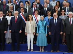 This conference near Paris in June 2018 was said to be the target of a bomb plot by alleged Iranian agents. Front row, from left: Canadian foreign minister John Baird, retired Canadian politician Stephen Joseph, Colombian-French politician Ingrid Betancourt, Maryam Rajavi, leader of the People's Mujahedin of Iran, Rudolph Giuliani, attorney to President Donald Trump, and former US Speaker of the House Newt Gingrich (Picture: Zakaria Abdelkafi/AFP via Getty Images)