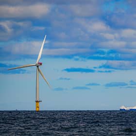 A ship passing wind turbines at RWE's Gwynt y Mor, the world's 2nd largest offshore wind farm located off the coast of North Wales.