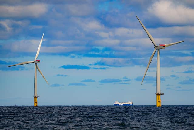 A ship passing wind turbines at RWE's Gwynt y Mor, the world's 2nd largest offshore wind farm located off the coast of North Wales.