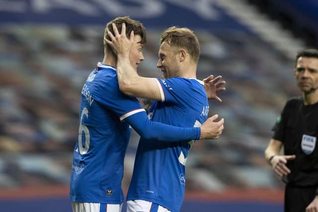 GLASGOW, SCOTLAND - APRIL 04: Rangers' Nathan Patterson (L) celebrates making it 4-0 with Scott Arfield during a Scottish Cup Third Round tie between Rangers and Cove Rangers at Ibrox Stadium, on April 04, 2021, in Glasgow, Scotland. (Photo by Alan Harvey / SNS Group)