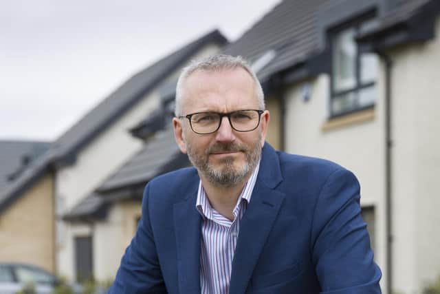 Innes Smith, the chief executive of Springfield Properties, outside one of the firm’s show homes.