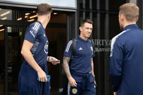 Jack Hendry, Ryan Jack and Stephen Kingsley prepare to leave Scotland's base camp for Poland.