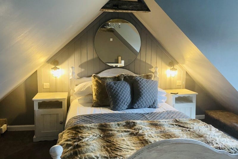 The first floor bedroom has views over the sea - and a comfortable double bed.