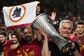 Roma's head coach Jose Mourinho celebrates with the trophy after his team won the UEFA Europa Conference League final against Feyenoord at the Air Albania Stadium in Tirana on May 25, 2022. (Photo by OZAN KOSE / AFP) (Photo by OZAN KOSE/AFP via Getty Images)