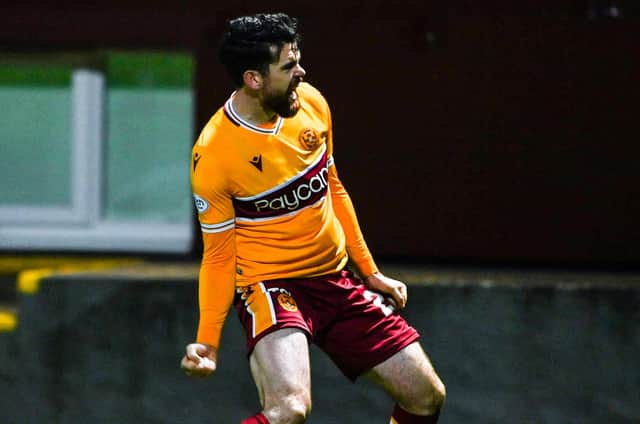 Liam Donnelly celebrates after scoring to make it 2-1 Motherwell . (Photo by Paul Devlin / SNS Group)