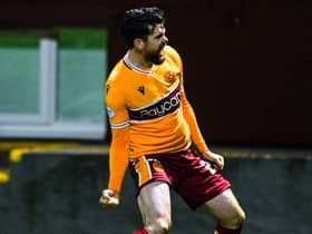 Liam Donnelly celebrates after scoring to make it 2-1 Motherwell .  (Photo by Paul Devlin / SNS Group)
