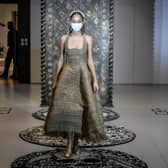 A model wears a creation by Christian Dior's during a fitting session at Christian Dior's Haute Couture fashion house in Paris