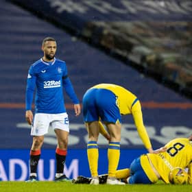 Rangers' Kemar Roofe (centre) is booked for the challenge on Murray Davidson that earned a two-match ban following an SFA review (Photo by Alan Harvey / SNS Group)