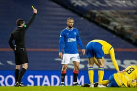 Rangers' Kemar Roofe (centre) is booked for the challenge on Murray Davidson that earned a two-match ban following an SFA review (Photo by Alan Harvey / SNS Group)