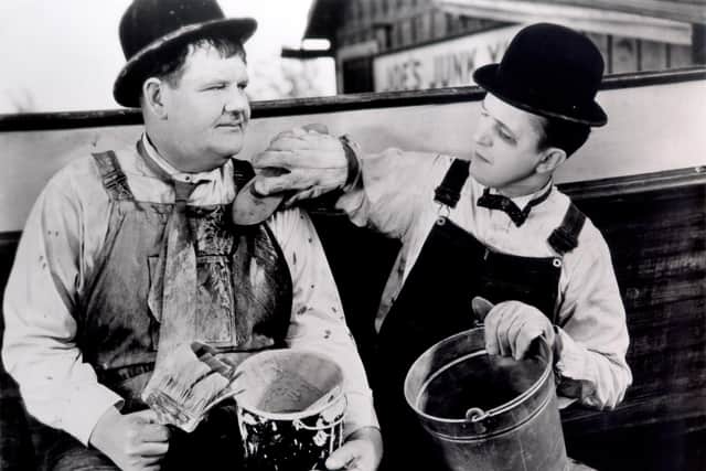 Laurel and Hardy's visit to the hotel ended in eight people being hospitalised after waiting crowds surged to see the comedy duo. PIC: CC.