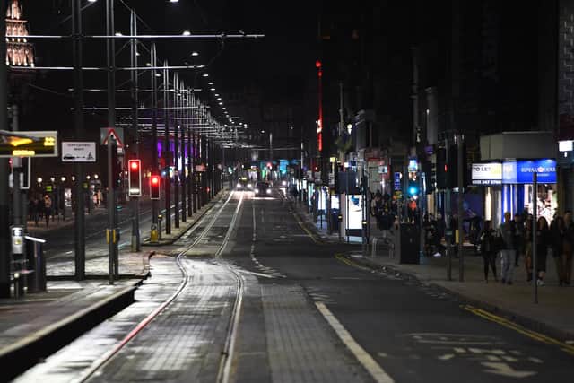 Edinburgh on Hogmanay 2021 - the SCC says Omicron-prompted restrictions plunged Scotland’s businesses 'back into a spate of economic limitations and curtailments'. Picture: Andy Buchanan/AFP via Getty Images.