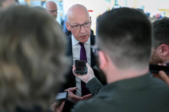 John Swinney speaks to journalists following First Minister's Questions at the Scottish Parliament. Picture: Jeff J Mitchell/Getty Images